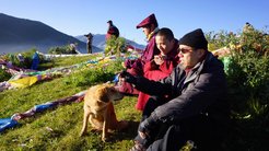 Taking a break from a landscape study with monks in a Tibetan location.