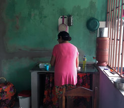 Dona Aparecida in her home in Governador Valadares, Brazil (2019). Photo: Dora Sampaio.